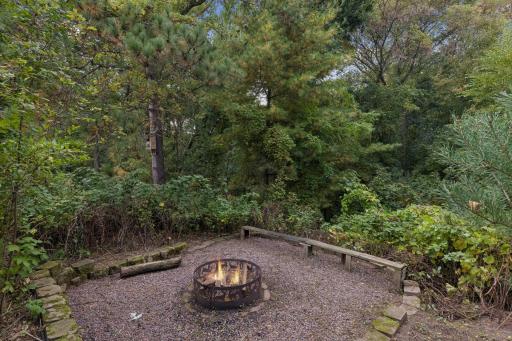 Gather around the inviting backyard fire pit for cozy evenings, great conversations, and memories under the stars.