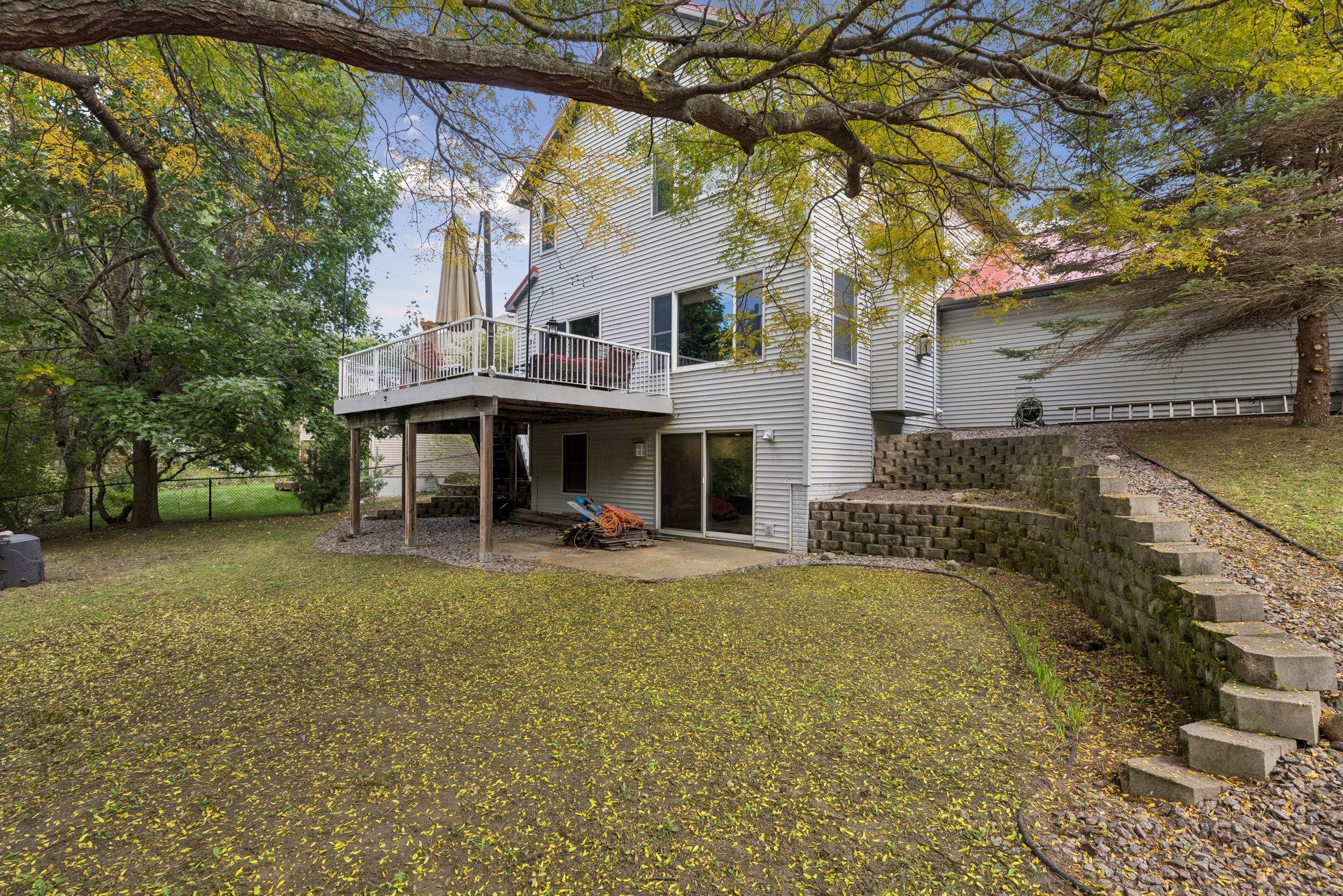 The walkout lower level opens to a wonderful patio beneath the deck, creating another inviting outdoor living space.