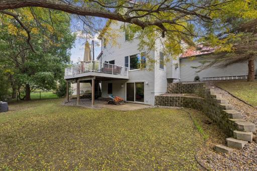 The walkout lower level opens to a wonderful patio beneath the deck, creating another inviting outdoor living space.