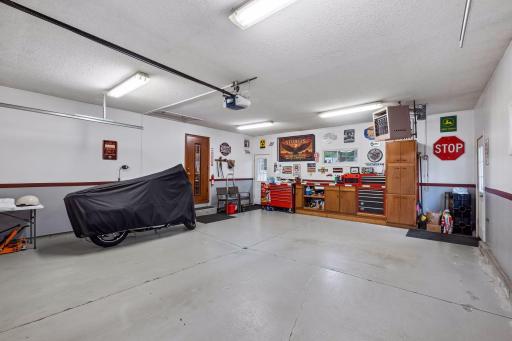 Stay comfortable year round in the heated, insulated attached garage, complete with built in storage and a floor drain for added functionality.