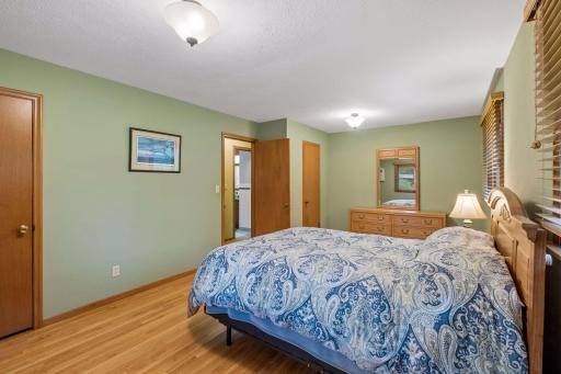 Two closets give this spacious primary bedroom tons of storage, making it easy to keep your wardrobe and belongings organized + it could easily turn into 2 bedrooms if needed!