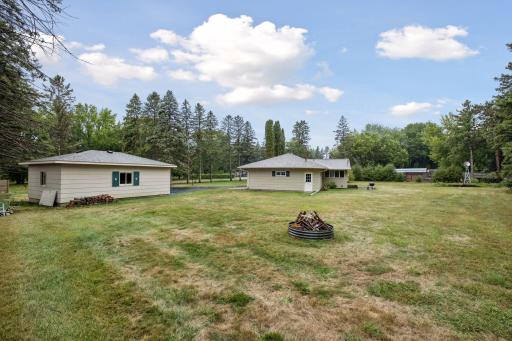 Enjoy the generous yard, offering plenty of space for outdoor gatherings, quiet relaxation, and everyday enjoyment.