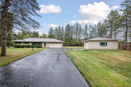 A detached garage provides additional parking, generous storage, and flexible space for hobbies, equipment, or recreational gear.