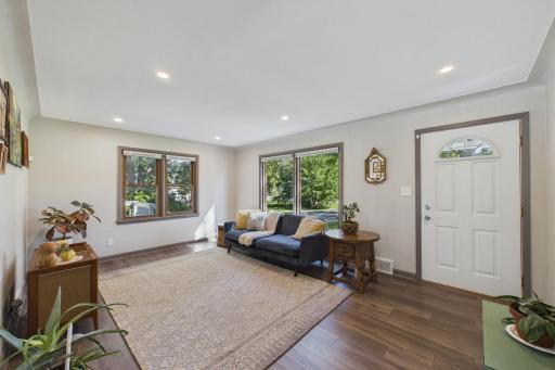 Spacious Family Room with Large Front-Facing Windows & Welcoming Entry