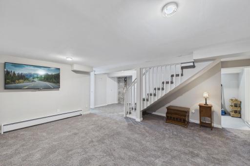 Open Basement Family Area with Access to Bedrooms, Bath & Laundry