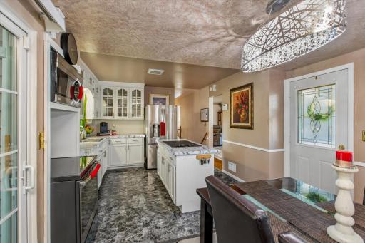 The glass-front upper-cabinets add a refined look to the space