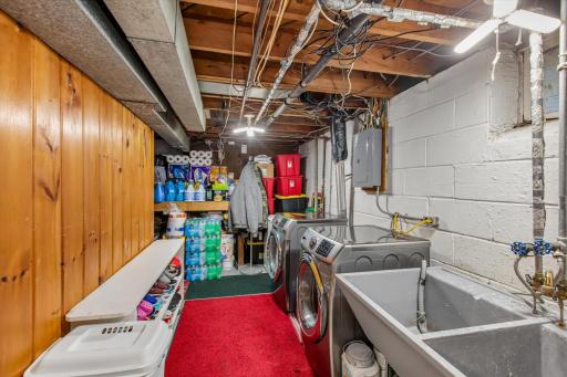 Large laundry room with utility sink & lots of room for storage