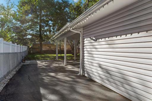 Nice long driveway (with plenty of parking!) leads to private backyard