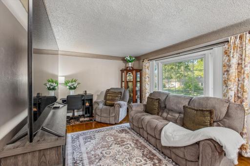Large windows in living room keep this room bright!