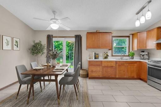 6432 Zealand Ave N Kitchen dinning staged AI.jpg