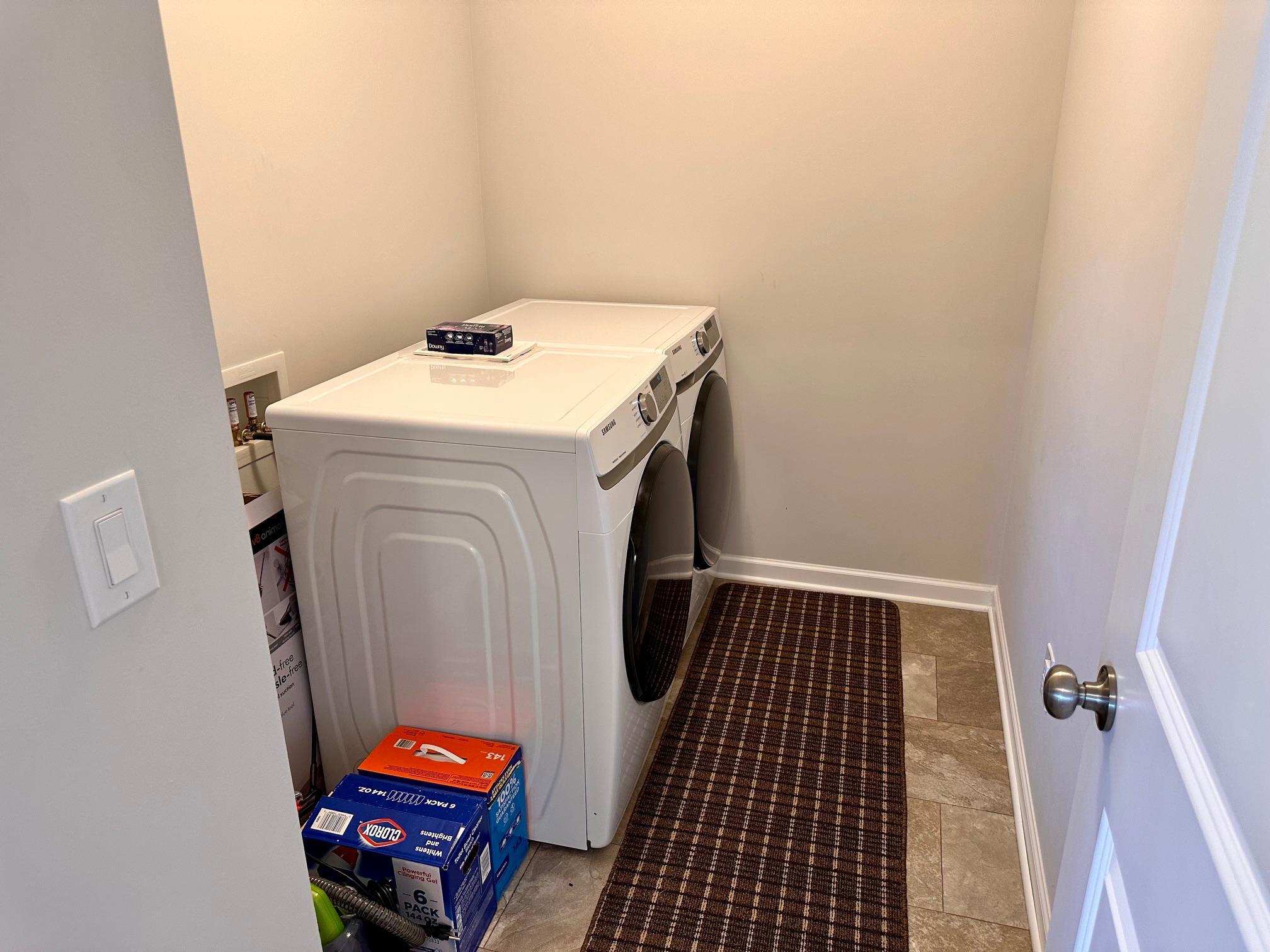 Laundry room conveniently located on the upper level.jpeg