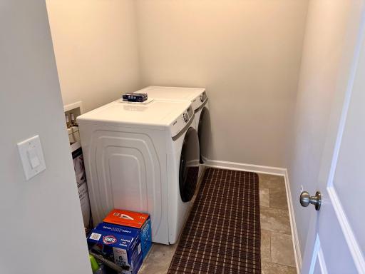 Laundry room conveniently located on the upper level.jpeg