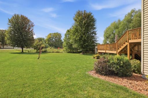 An inground sprinkler system keeps the landscaping looking its best, with the sprinkler control boxes conveniently located in the garage for easy access and adjustment.
