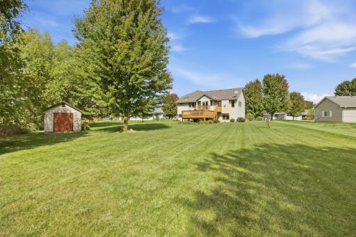The deck-side security camera includes a floodlight for added nighttime visibility, while cameras at the front of the home and rear of the garage record to the cloud through the Ring system.