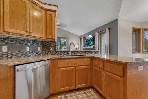 Open sight lines into the living room and dining room allow for visiting with family and guests while preparing meals or doing a quick cleanup.
