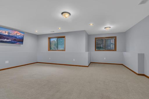 Mechanicals include a high-efficiency forced-air furnace (new Sept 2025), central air conditioner (new Sept 2025), RenewAire energy recovery ventilator, power-vented gas water heater, a water softener, and a 200-amp electrical panel.