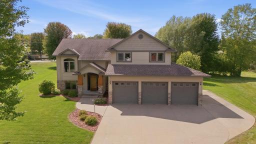 Impressive three-stall garage. Each individual stall has its own insulated overhead door and quiet belt-drive opener. All three garage doors feature keyless exterior touchpads, and each opener includes a remote.