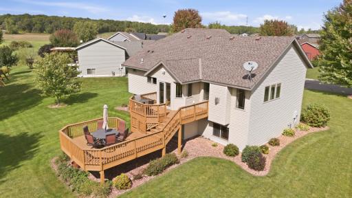 This home stands apart from the standard bi-level home with its spacious and flexible living areas, three finished and heated garage stalls, multiple walk-in closets, and thoughtful storage.