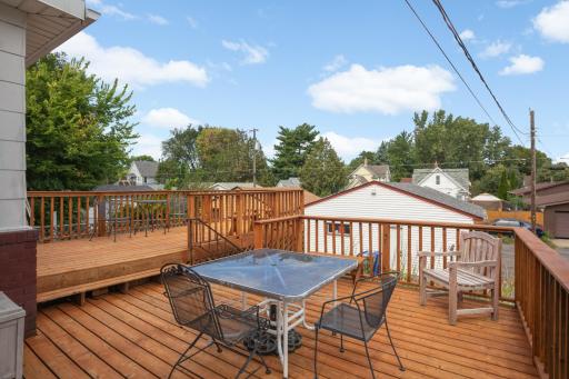 Spacious rear deck provides plenty of room for outdoor dining and entertaining