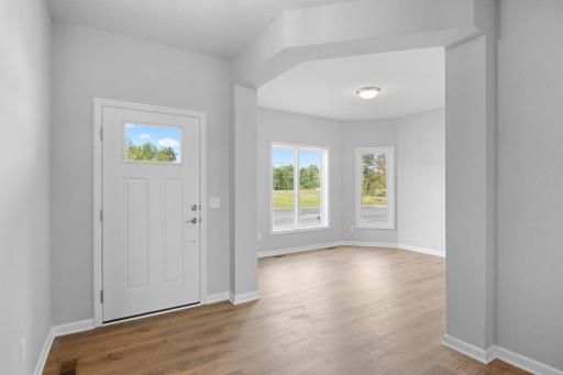 Entering the home you are greeted by an amazing den space. Perfect for a secondary living area, office, or even play area for the kids.