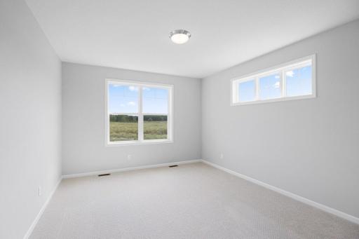 The expansive owner's suite with private bath will surely make those early mornings a breeze.