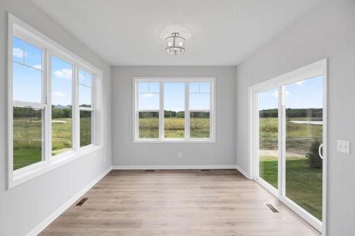 Morning room addition...youbetcha. An extra living space that flows seamlessly with the kitchen and dining area.