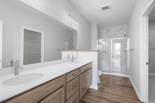 Vanity space is no problem with this one! Also featuring a large walk-in shower.