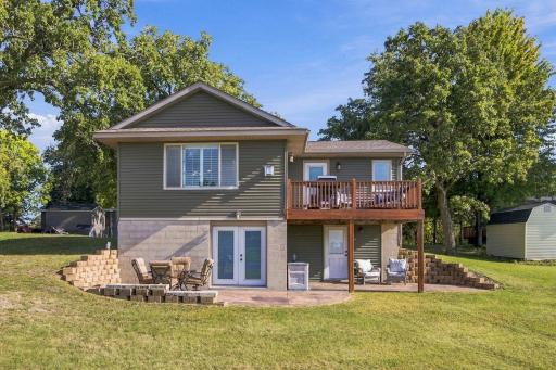 This charming home offers 2 entrances from the backyard and also to large patio spaces.