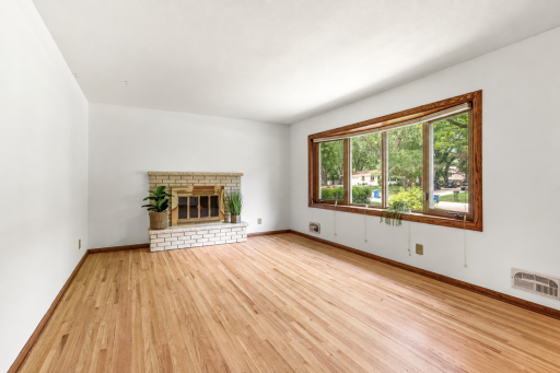 Original hardwood flooring throughout the main level