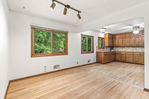 The kitchen hardwood flooring is brand new and added to match the rest of the main level