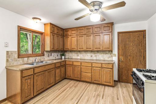 Great light in this kitchen between the main window and the connected dining room windows.
