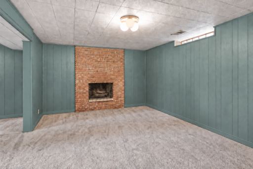 There are 2 fireplaces in this home. But the fireplaces condition are not guaranteed sitting dormant for many years. This photo has been digitally enhanced.