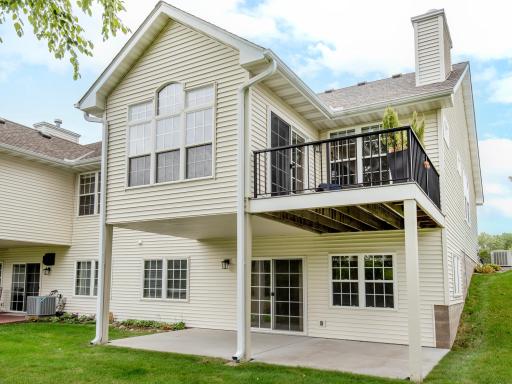 Large concrete patio provides plenty of space for outdoor dining, entertaining and relaxing.