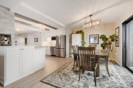 Summit House Penthouse 2313 Dining to Kitchen.jpg