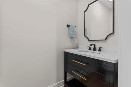 Centrally located powder bath on the main level.
