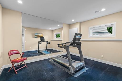 Additional fitness room offering flexible space for a home gym, hobby room, or other needs.