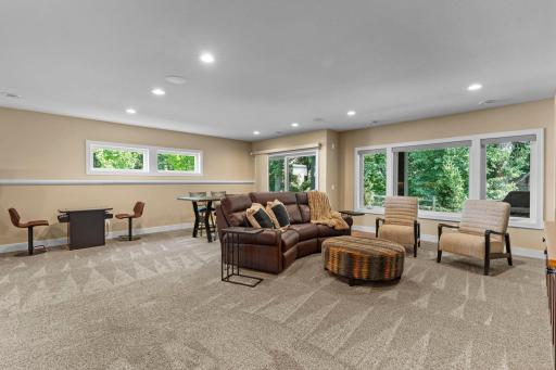 Natural light and walkout access to the patio create an inviting connection to the outdoors.