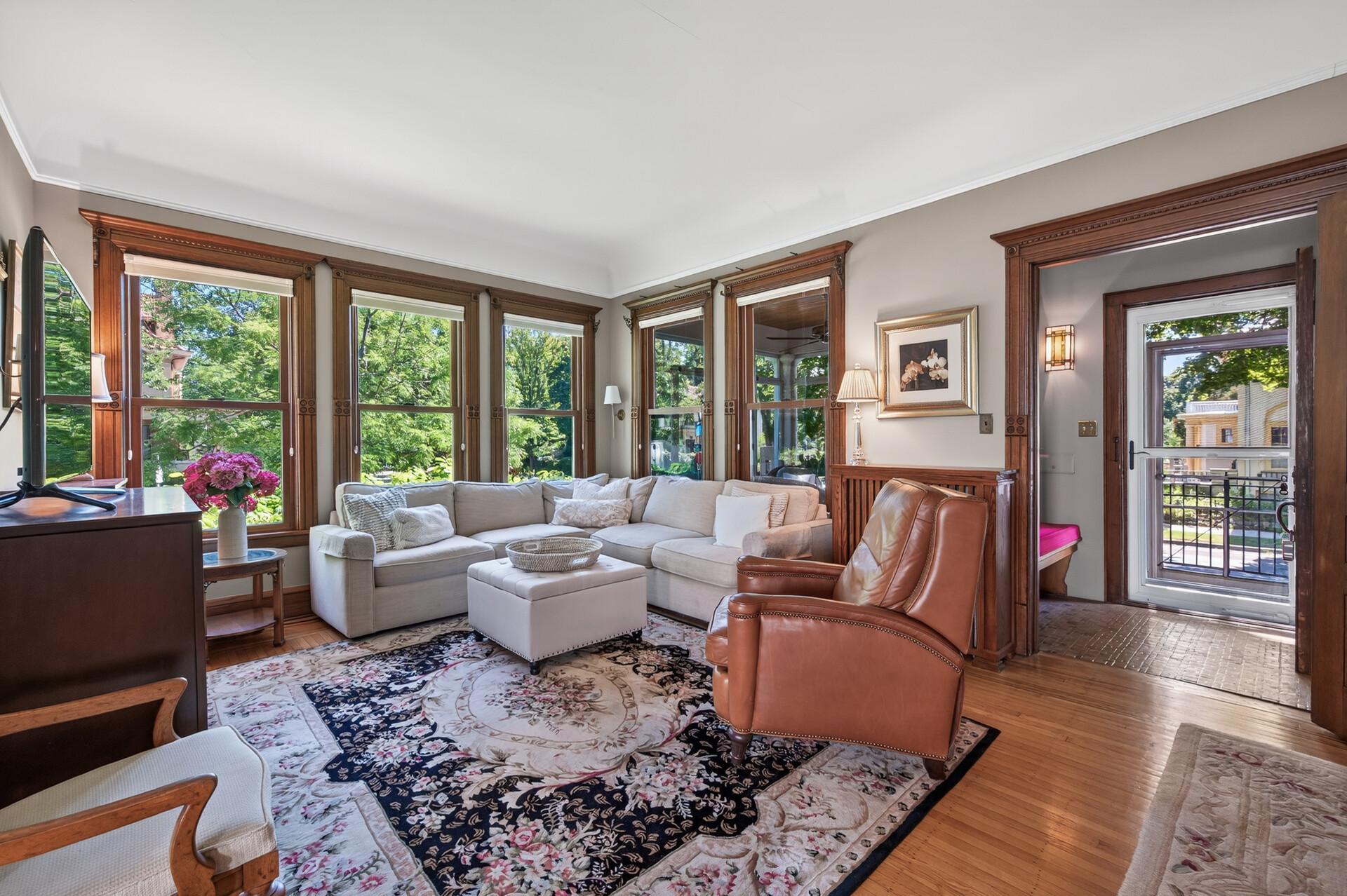 Walls of windows, warm hardwoods, and all that greenery outside. This room just feels good.