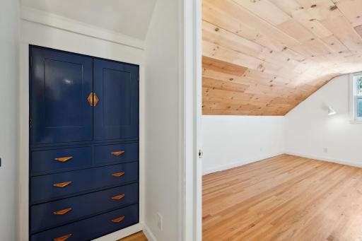 Upper-level hallway with built-in's and vintage midcentury modern hardware.