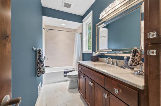 Main floor full bath for guests.
