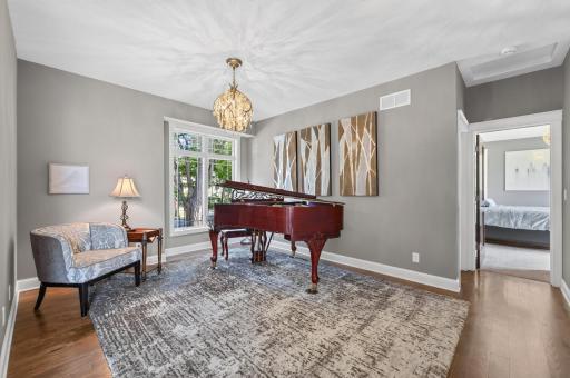 This room could serve as a formal dining area, office space or whatever you choose.