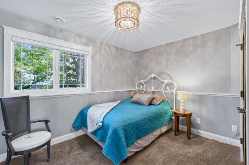 This downstairs bedroom faces the front yard.