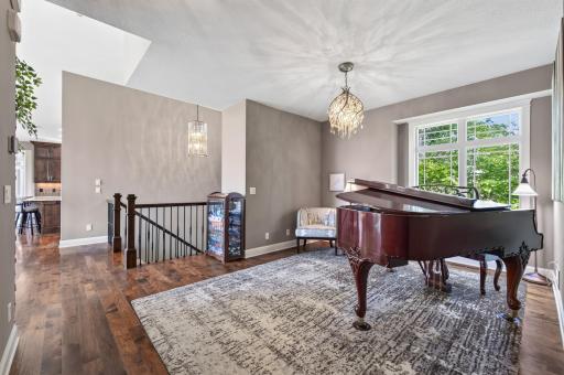 Around the corner from the living room is a sitting room.