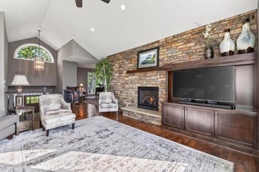 The stone wall gives texture and personality to the entire room.
