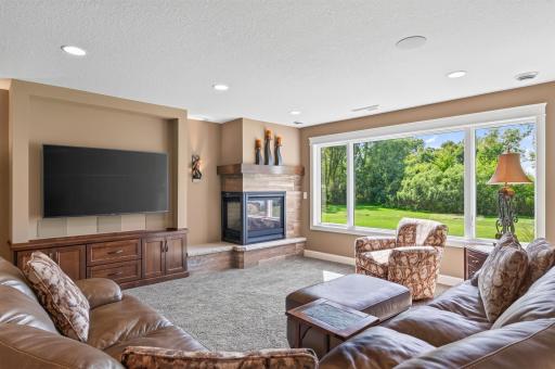 The two sided gas fireplace creates coziness in the winter.