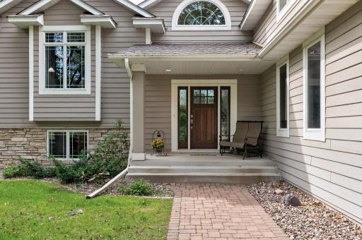 The front porch is covered to welcome your guests.