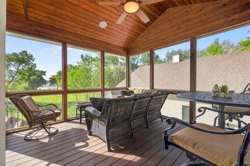 The screen porch has room for relaxing without the MN bugs.