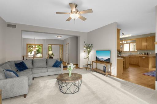 This view showcases the easy connection between the Living Room, Foyer and Kitchen. The open layout provides defined spaces while keeping the main living areas connected for everyday living and entertaining.