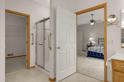 Separate shower and convenient access to the large Walk-In Closet complete the private Ownerâs Bath.