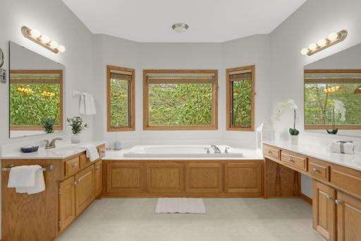 Plenty of room to get ready with expansive vanity and counter space, plus great natural light.
